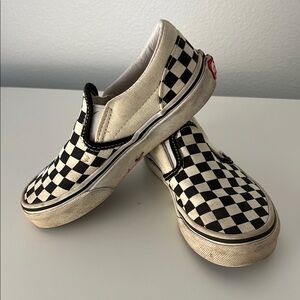 Vans Black and White Sneakers with Classic Slip-On Style